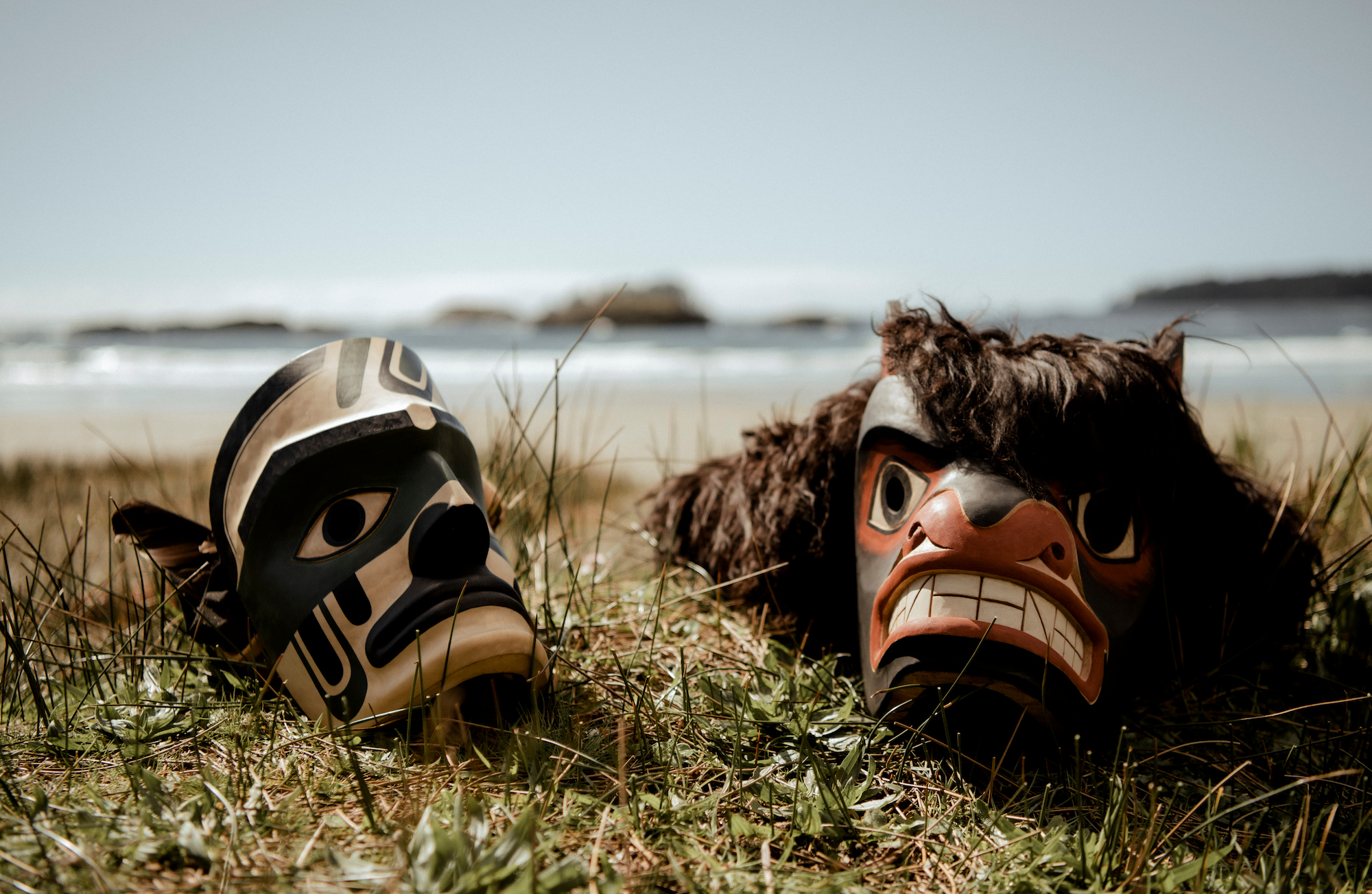 naauu Tla-o-qui-aht masks on beach 